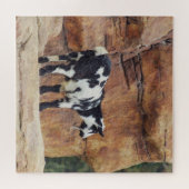 Schwarze und weiße Bergziege auf Felsen Puzzle (Horizontal)