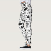 SCHWARZE UND WEISSE HALLOWEEN DOODLES LEGGINGS (Links)