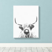 Schwarze und weiße Hochlandkuh Leinwanddruck (Insitu (Holzboden))