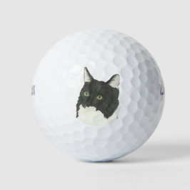 Schwarze und weiße Katze Golfball