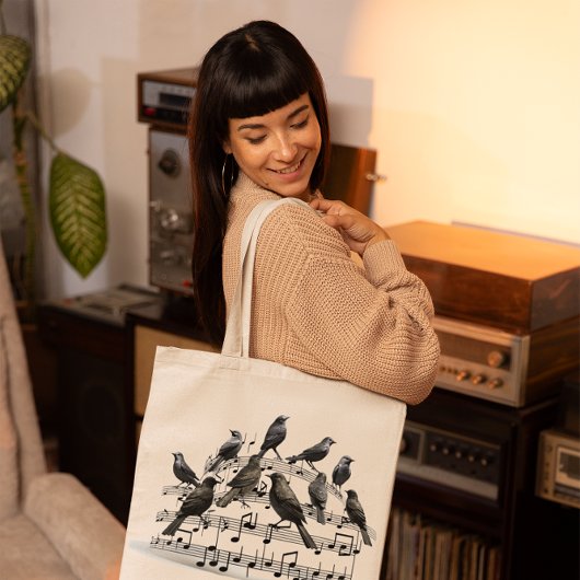 Schwarze Vögel auf einer musikalischen Komposition Tragetasche