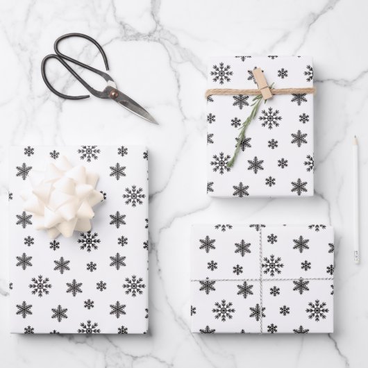 Schwarze Weihnachtsschneeflocken im weißen Hinterg Geschenkpapier Set (Vorderseite)