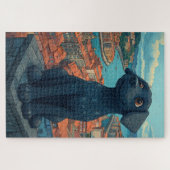 Schwarze Welpenstatue mit Blick auf die Stadt Puzzle (Horizontal)