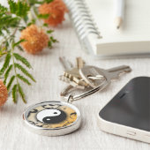 Schwärzen Sie mit BronzeYin u. Yang mit Rollen Schlüsselanhänger (Seite)