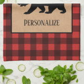 Schwarzer Bär auf einem roten und schwarzen Karier Geschirrtuch (Gefaltet)