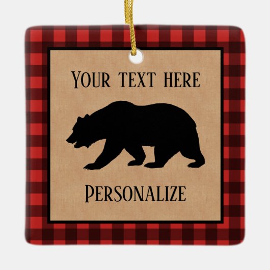 Schwarzer Bär auf einem roten und schwarzen Karier Keramikornament (Vorderseite)
