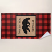 Schwarzer Bär auf einem roten und schwarzen Karier Strandtuch (Vorderseite)