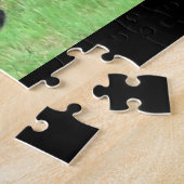 Schwarzer Bär im Hinterhof Puzzle (Seite)