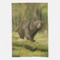 Schwarzer Bär Stepping auf einem Baumstamm