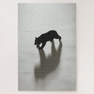 Schwarzer Bärenschatten in weißer Wildnis Puzzle