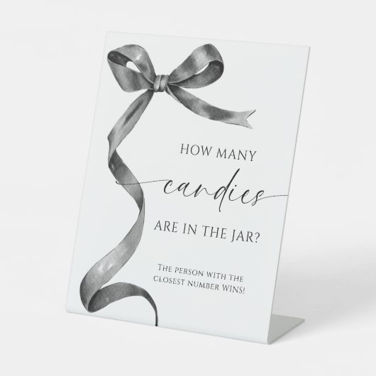 Schwarzer Bow, wie viele Candies im Jar sind Sockelschild (Vorderseite)