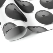 Schwarzer Bowlingball auf Weiß Geschenkpapier (Rolleneckpunkt)