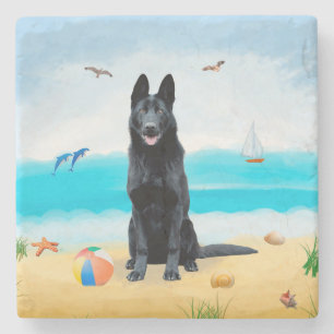 Schwarzer Deutscher Schäferhund am Strand Steinuntersetzer