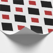 Schwarzer Diamant, kühne weiße Grenze auf Rot Geschenkpapier (Ecke)