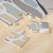 Schwarzer Doodle fährt mit Roller durch europäisch Puzzle (Seite)