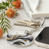 Schwarzer goldfarbiger Schlüsselanhänger (Vorderseite rechts)