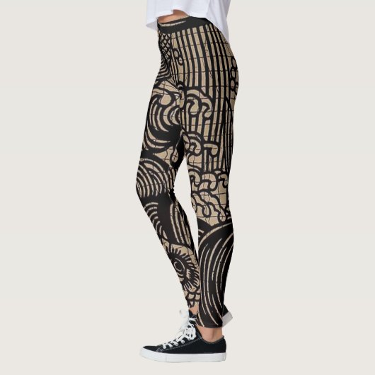 Schwarzer Goldfisch Leggings (Links)