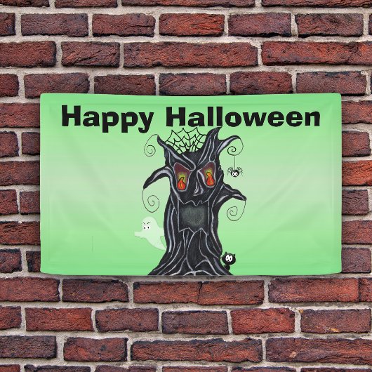 Schwarzer Halloween-Baum mit bösen Gesichtern Banner