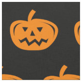 Schwarzer Halloween-Stoff mit geschnitzten orangen Stoff (Nahaufnahme)