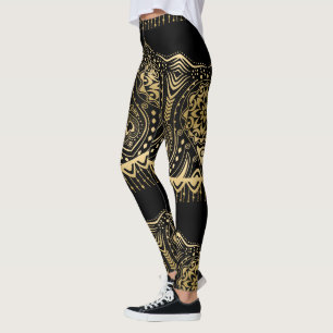 Schwarzer Hintergrund für die goldene Spitze Leggings
