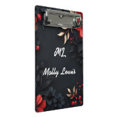 Schwarzer Hintergrund mit Blumendekoration Mini Klemmbrett (Schrägansicht)