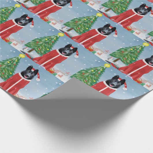 Schwarzer Hirte Hund in Schnee Weihnachtsgeschenke Geschenkpapier (Ecke)