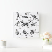 Schwarzer Katzenball und Wollgarnball, Alexandre S Quadratische Wanduhr (Zuhause)