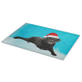 Schwarzer Labrador Hund sitzend im Schnee Weihnach Schneidebrett (Ecke)