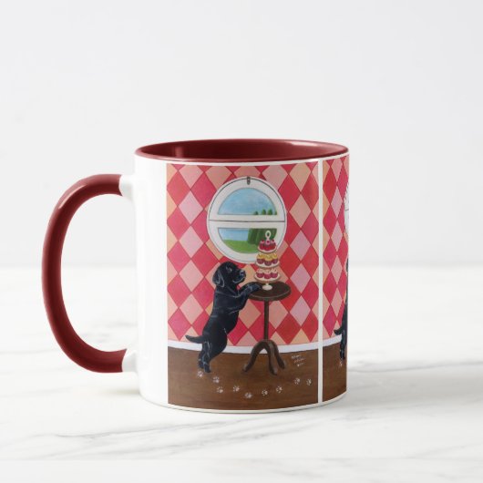 Schwarzer Labrador-Welpe mit kleinen Kuchen Tasse (Links)