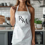 Schwarzer Minimalwert für Monogramm Schürze<br><div class="desc">Erhöhen Sie Ihren Küchenstil mit dieser Monogram Black Minimalistische Schürze. Diese Schürze ist schlicht und elegant gestaltet und eignet sich sowohl für Zuhause-Köche als auch für berufliche Koch. Das individuell anpassbare Monogramm fügt eine persönliche Touch hinzu, die sicherstellt, dass Sie stilvoll kochen. Diese Schürze aus langlebigen Materialien ist so konzipiert,...</div>