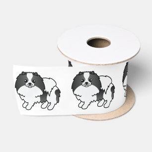 Schwarzer Parti-Color-Spitz Niedlicher Hund Satinband