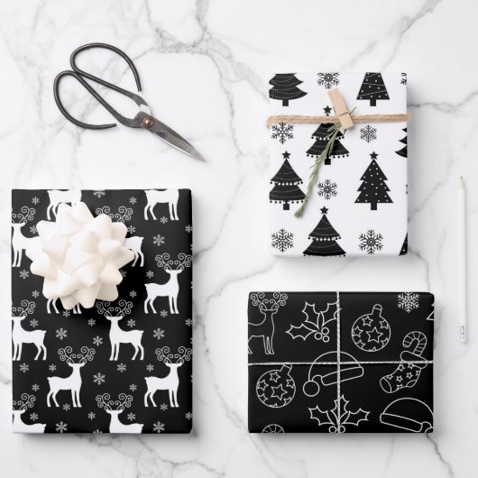 Schwarzer Rentier, Weihnachtsbaum und Urlaubsmuste Geschenkpapier Set (Vorderseite)