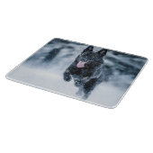 Schwarzer Schäfer im Schnee Schneidebrett (Ecke)