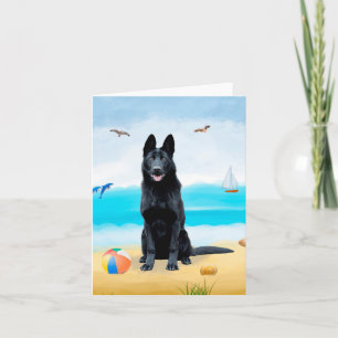 Schwarzer Schäferhund am Strand Karte