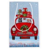 Schwarzer Schäferhund in Auto mit dem Weihnachtsma Mittlere Geschenktüte (Vorderseite)