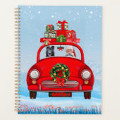 Schwarzer Schäferhund in Auto mit dem Weihnachtsma Planer (Vorderseite)