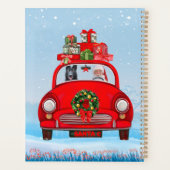 Schwarzer Schäferhund in Auto mit dem Weihnachtsma Planer (Rückseite)