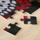 Schwarzer Schmetterling in der Roten Blume Bush Puzzle (Seite)