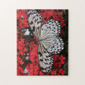Schwarzer Schmetterling in der Roten Blume Bush Puzzle (Vertikal)