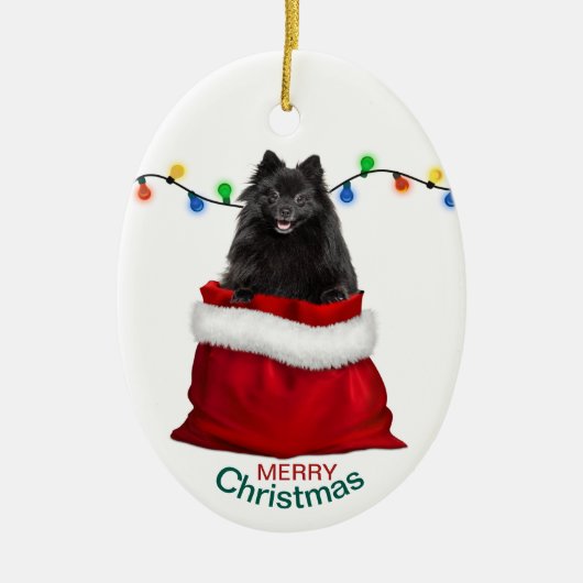 Schwarzer Spitz Hund in der Geschenktasche Weihnac Keramik Ornament (Vorne)