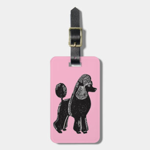 Schwarzer Standard-Poodle mit rosa Gepäckmarke Gepäckanhänger