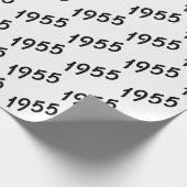 schwarzer Text aus dem Jahr 1955 auf weiß Geschenkpapier (Ecke)