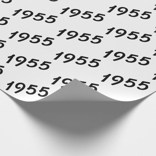 schwarzer Text aus dem Jahr 1955 auf weiß Geschenkpapier (Ecke)