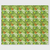 Schwarzer und orangefarbener Schmetterling auf wei Geschenkpapier (Flach)