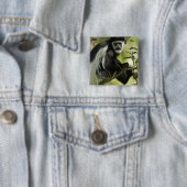 Schwarzer und weißer Colobus-Affe Button (Beispiel)