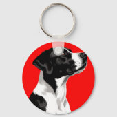 Schwarzer und weißer Hund auf fett rotem Hintergru Schlüsselanhänger (Rückseite)