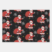 Schwarzer Weihnachtsmann mit Schneeflocken und Ste Geschenkpapier Set (Vorderseite)
