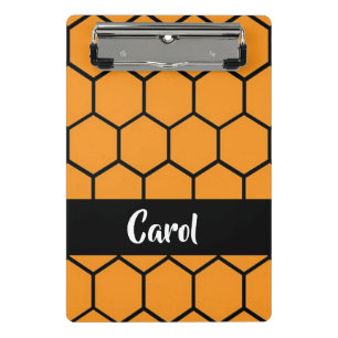 Schwarzer Zaun auf Orange Mini Klemmbrett