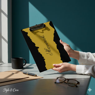 Schwarzes Clipboard mit goldenem Metall und angeze Klemmbrett
