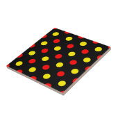Schwarzes Design mit roten und gelben Tupfen Fliese (Seite)